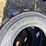 (4)-new-12-16.5-skidsteer-tires-image-3