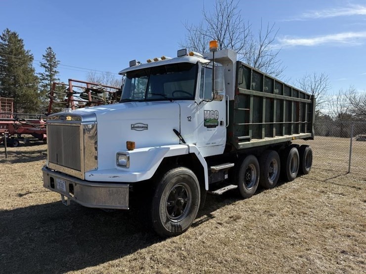 1990-white-gmc-autocar-dump-truck-image-1