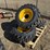 (4)-new-12-16.5-skidsteer-tires-w/rims-image-1