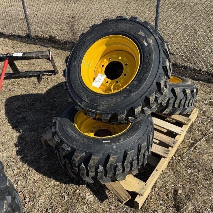(4) New 12-16.5 Skidsteer Tires w/rims