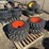 (4)-new-10-16.5-skidsteer-tires-w/rims-image-2
