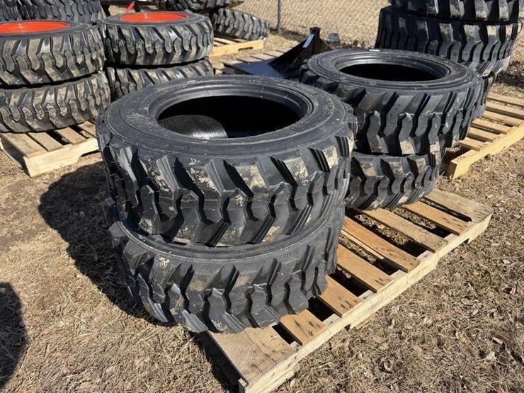 (4)-new-10-16.5-skidsteer-tires-image-1