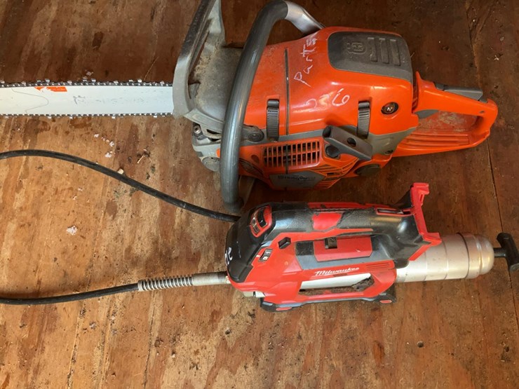 #276-•-husqvarna-550-xp-chainsaw-and-milwaukee-grease-gun-image-1