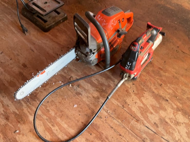 #276-•-husqvarna-550-xp-chainsaw-and-milwaukee-grease-gun-image-10