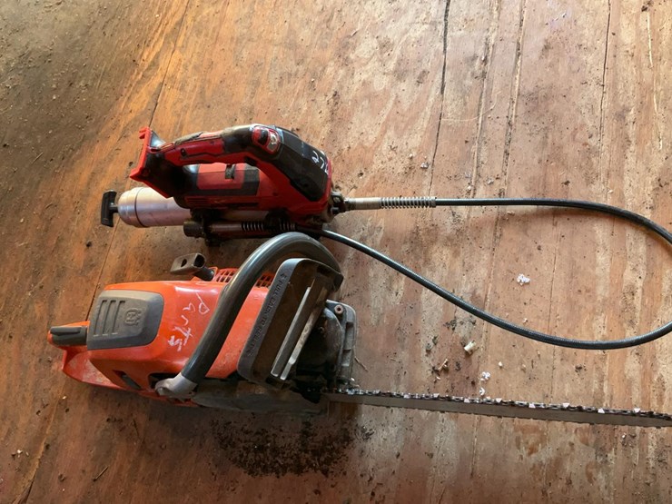 #276-•-husqvarna-550-xp-chainsaw-and-milwaukee-grease-gun-image-4