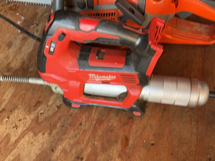 #276-•-husqvarna-550-xp-chainsaw-and-milwaukee-grease-gun-image-2