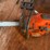 #276-•-husqvarna-550-xp-chainsaw-and-milwaukee-grease-gun-image-3