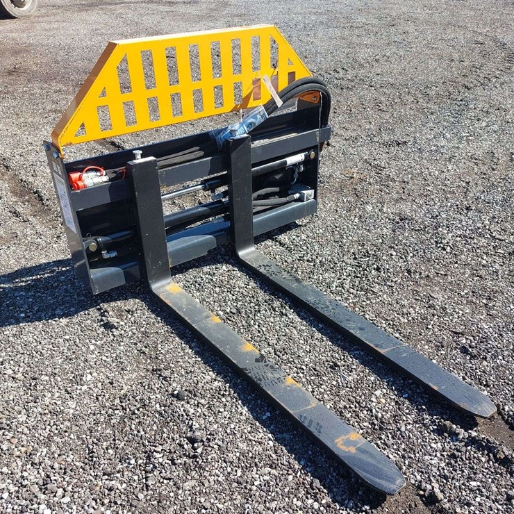 Wolverine Skid Steer Hydraulic Adjustable Pallet Forks
