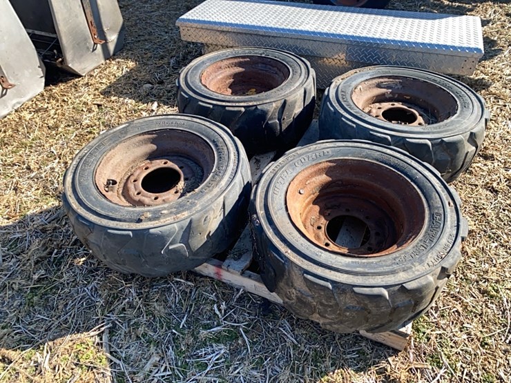 4----10-16.5-skidsteer-tires-on-8-bolt-rims-image-4