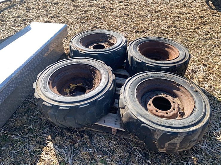 4----10-16.5-skidsteer-tires-on-8-bolt-rims-image-2