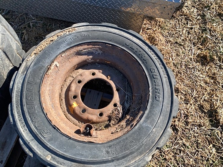 4----10-16.5-skidsteer-tires-on-8-bolt-rims-image-9