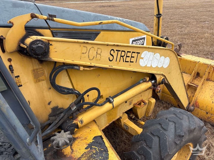 2004-deere-310sg-image-11