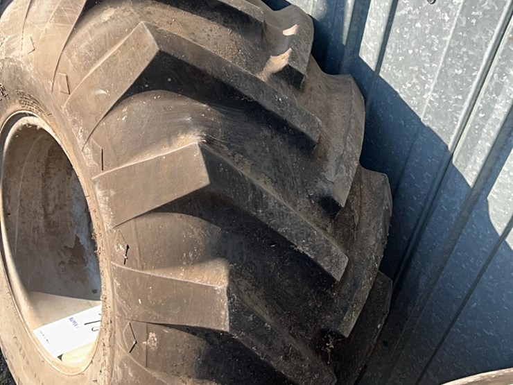 excellent-set-of-grip-tires,-size-is-16.5-l-–-16.1.--came-off-of-versatile-or-john-deere-self-propelled-swather,-always-been-stored-inside-image-9