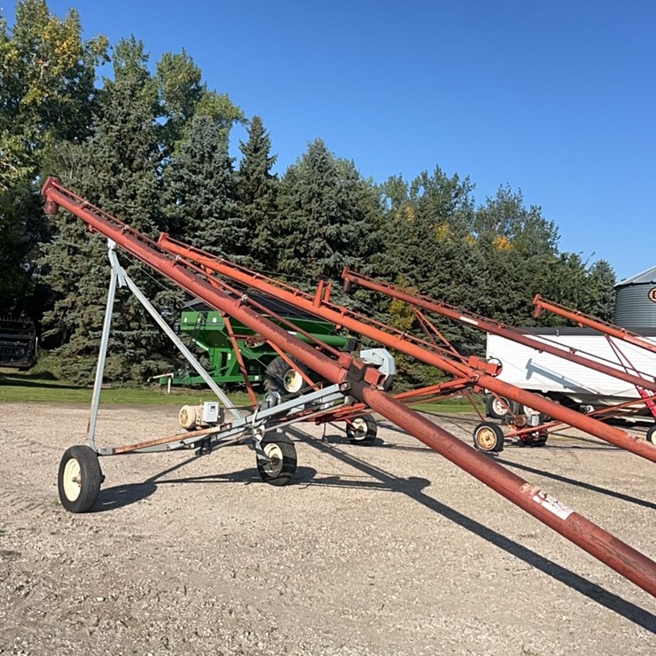 7 “x 37’Sakundiak model HD 7– 1200 auger with 7.5 hp Baldor single ph 220 electric motor