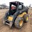 #1027-•-new-holland-lx985-skid-steer-image-1