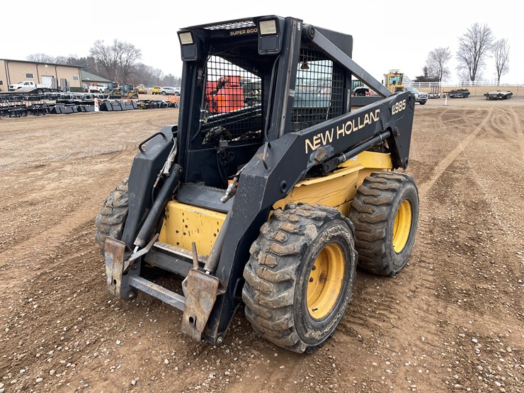 #1027-•-new-holland-lx985-skid-steer-image-1