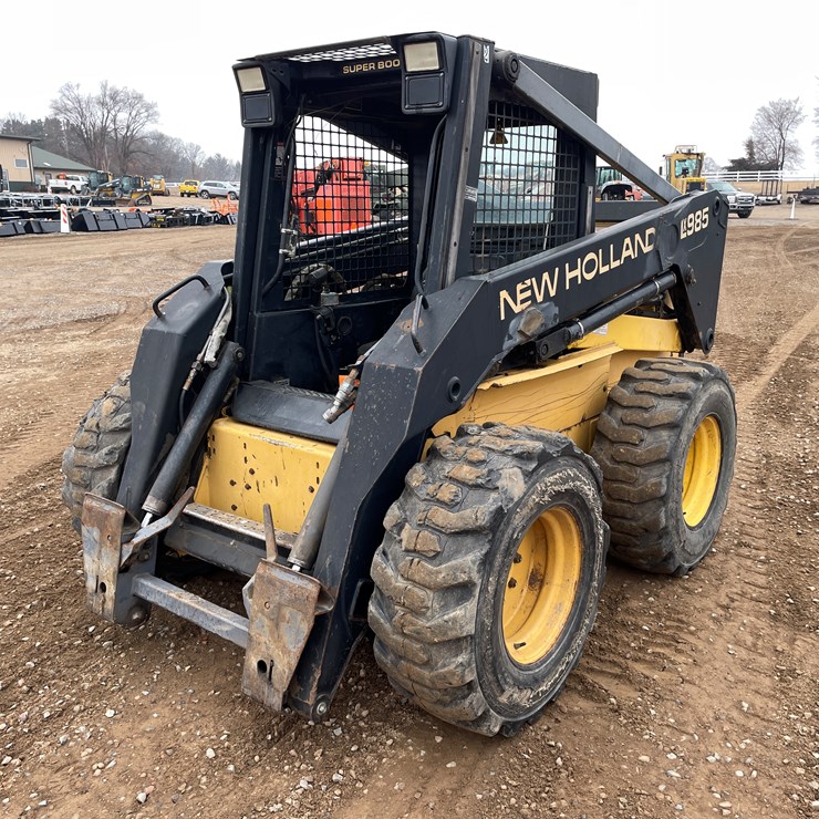 #1027 • New Holland LX985 Skid Steer