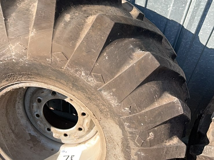 excellent-set-of-grip-tires,-size-is-16.5-l-–-16.1.--came-off-of-versatile-or-john-deere-self-propelled-swather,-always-been-stored-inside-image-12