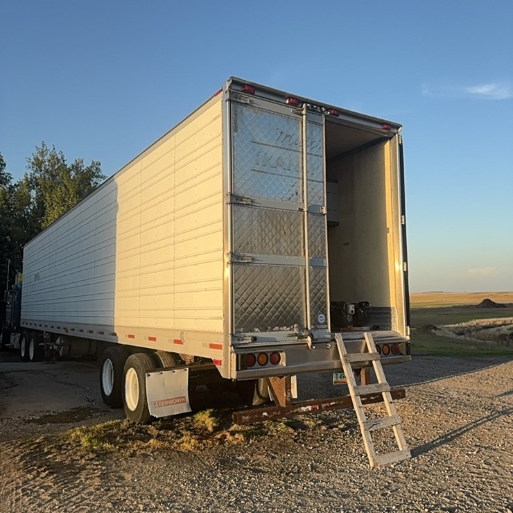 1996 sprayer trailer, 48’, fully equipped with three mixing cones, two pumps, hoses , four- 1650 gallon poly tanks, fully plumbed, complete sprayer setup, ready to use