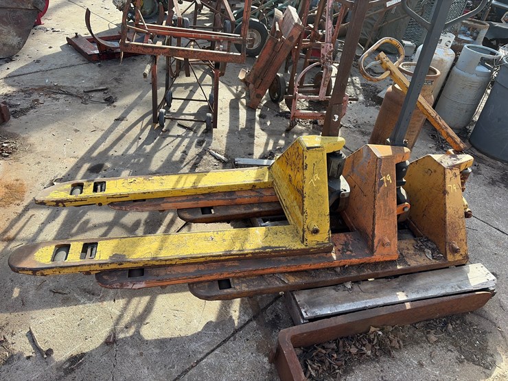 #79-•-group-of-three-pallet-jacks-image-1