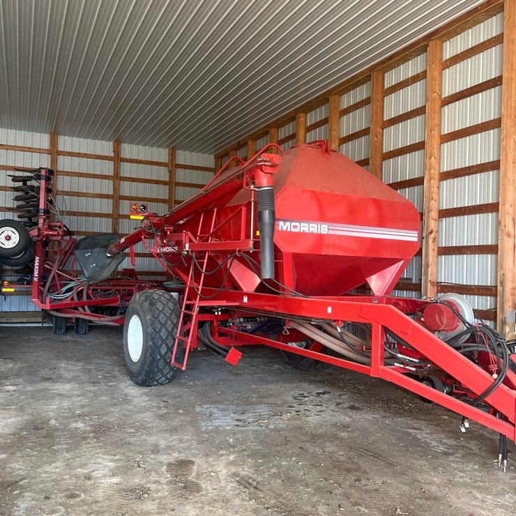 Lot 10. Morris air seeder, tow between with 10" eagle beaks, new seed meter unit, pristine condition, always shedded, highly maintained, none nicer