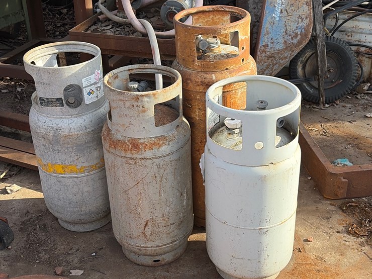 #84-•-group-of-four-forklift-propane-tanks-image-1