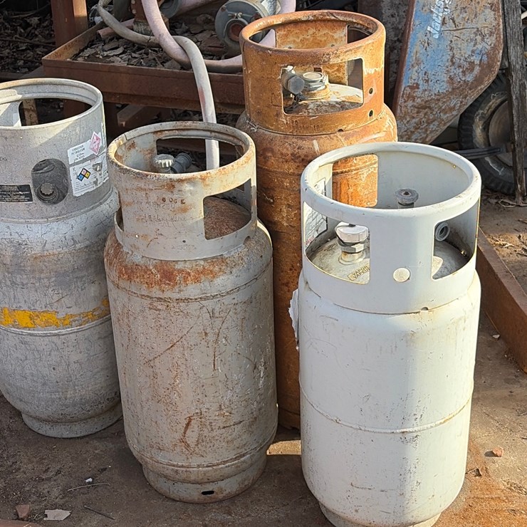 #84 • Group of four forklift propane tanks