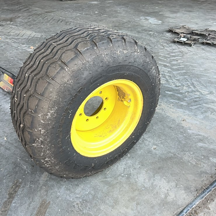 Brand new John Deere air seeder tire and rim, size is 140/55/R18 ￼