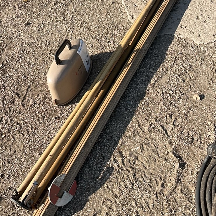 Survey tool, complete with scope, measuring stick, tripod