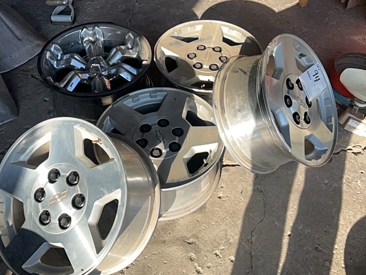 (5)-6-hole-chevy-rims,-complete-set-of-four-with-lug-nuts,-plus-one-extra-image-1