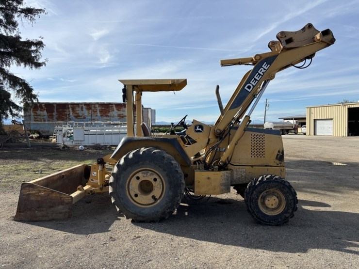 2004-deere-210le-image-7