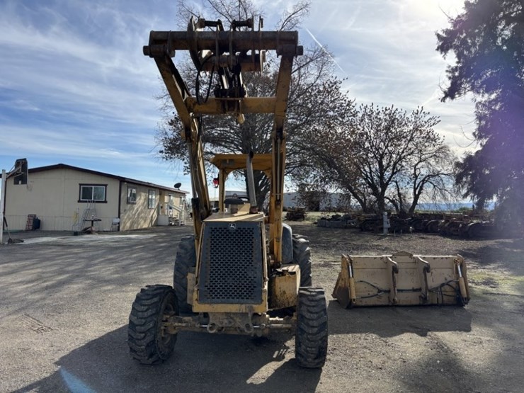 2004-deere-210le-image-8