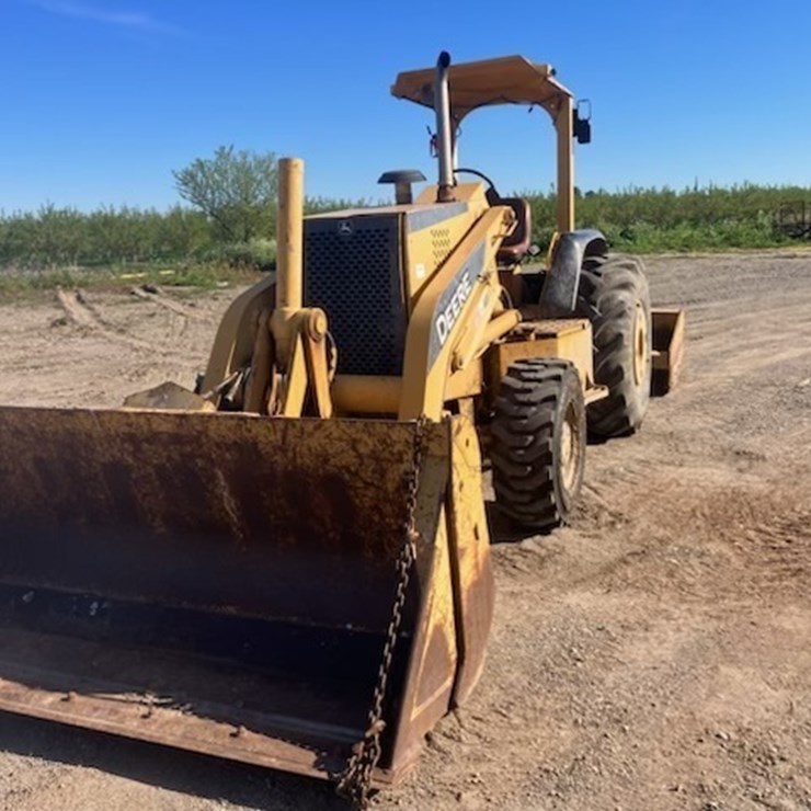 2004 DEERE 210LE