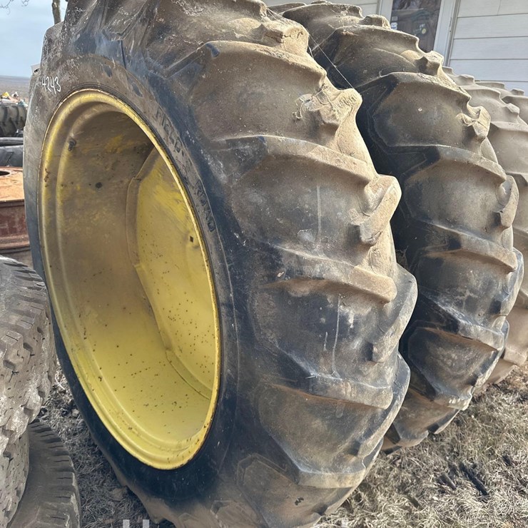 (2) 14.9-38 FIRESTONE TIRES ON 9-BOLT RIMS (HESS)