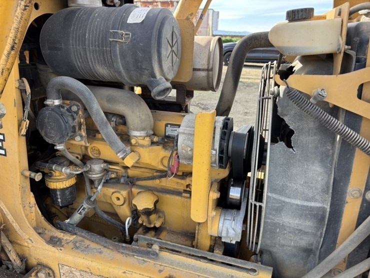 2004-deere-210le-image-17