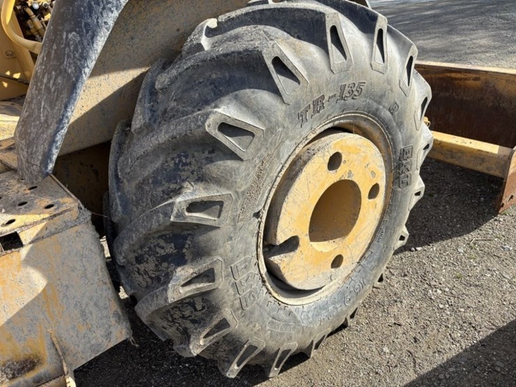 2004-deere-210le-image-10