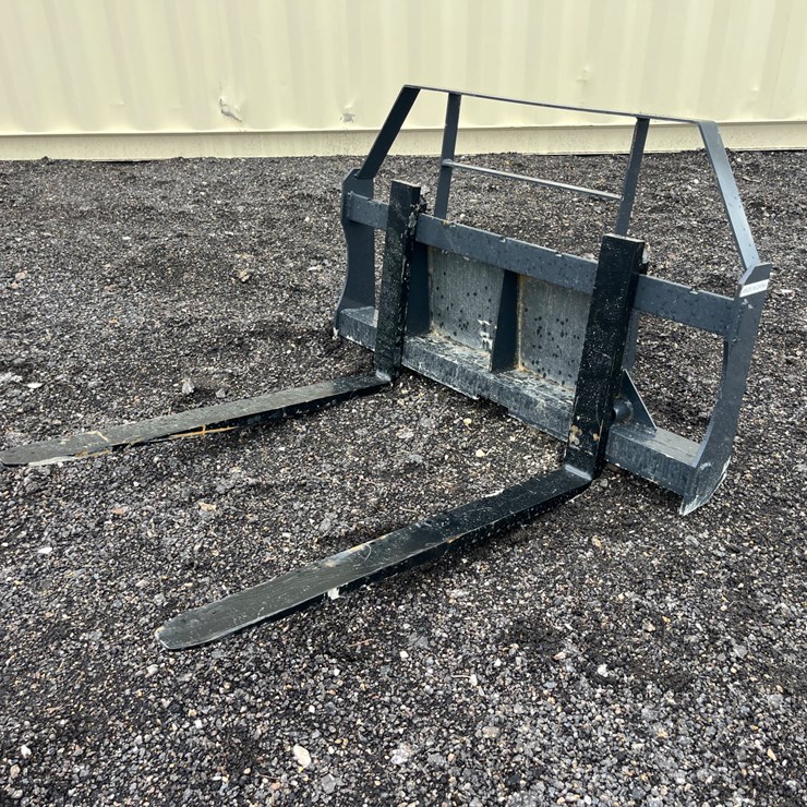 #5034 • New Land Honor Mini Skid Steer Pallet Forks