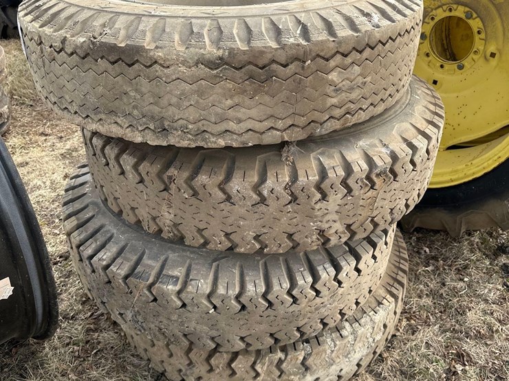 (4)-10.00-20-goodyear-tires-on-rims-(hess)-image-1