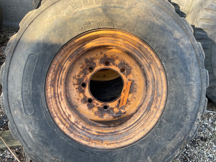 #6031-•-(3)-skidsteer-tires-on-8-bolt-rims-image-3