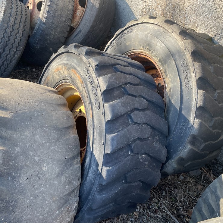 #6031 • (3) Skidsteer Tires on 8-Bolt Rims