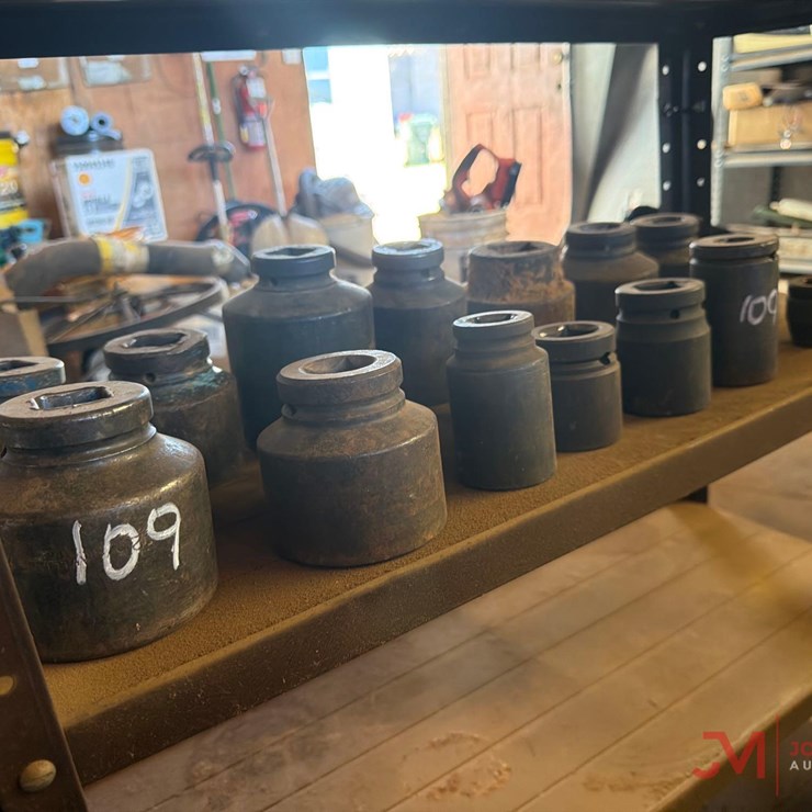 CONTENTS OF SHELF: VARIOUS SIZE 1/2" - 1" DRIVE SOCKETS