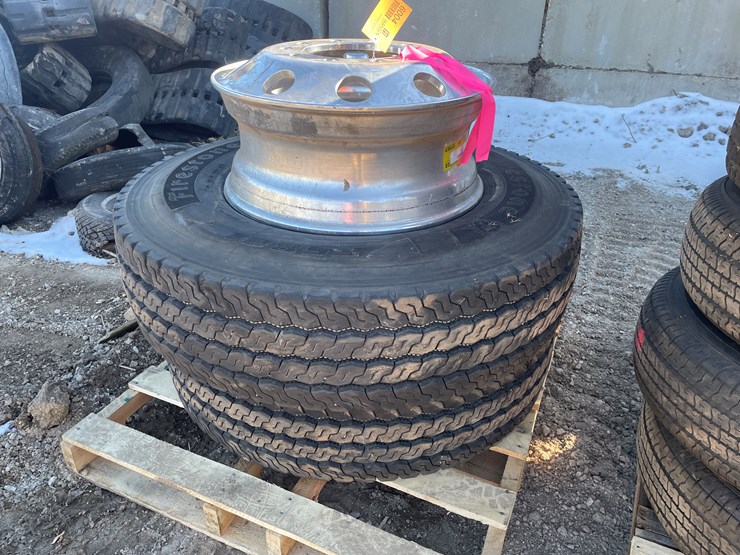 #6004-•-(2)-firestone-11r22.5-tires-on-10-bolt-rims-image-1