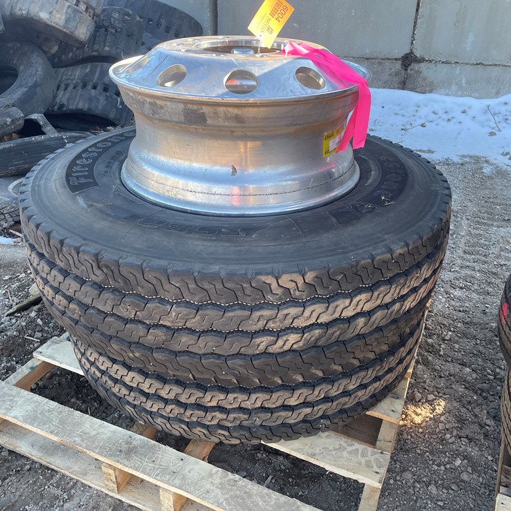#6004 • (2) Firestone 11R22.5 Tires on 10-Bolt Rims