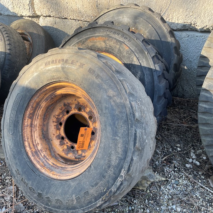 #6031 • (3) Skidsteer Tires on 8-Bolt Rims