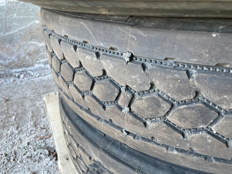 #6025-•-(3)-semi-tires-on-aluminum-10-bolt-rims-image-2