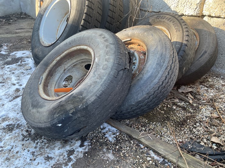 #6032-•-(4)-truck-tires-on-steel-rims-image-1