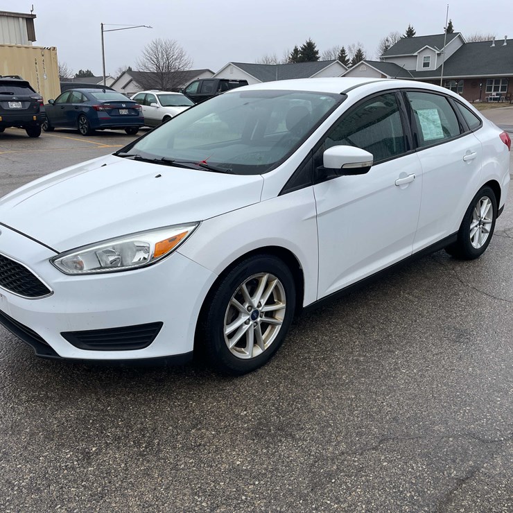 #1428 • 2015 White Ford Focus SE Sedan (Has WI Title)