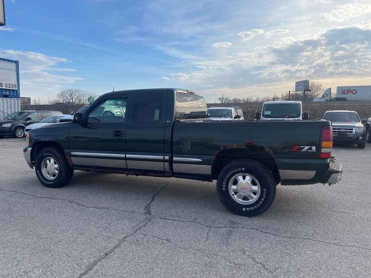 #1430-•-2002-green-gmc-sierra-(has-wi-title)-(of)-image-2