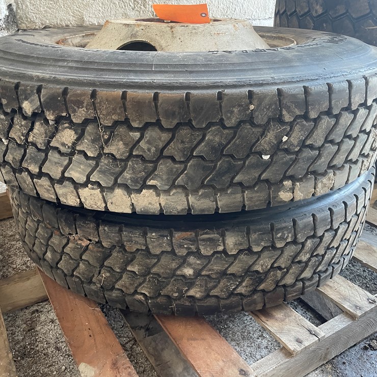 #6023 • (2) Tires on 10-Bolt Steel Rims