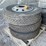 #6025-•-(3)-semi-tires-on-aluminum-10-bolt-rims-image-1